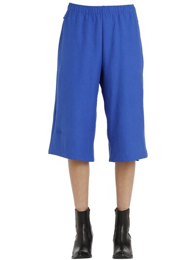 Vetements Champion Cotton Jersey Sweat Shorts In Blue